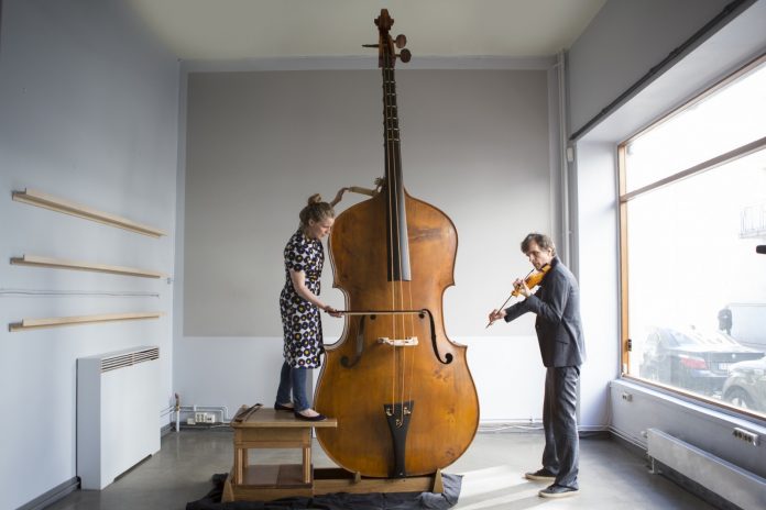 Norwegian Musician Plays the Largest String Instrument Ever Invented