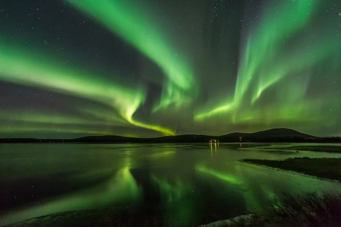 6666-Northern Lights_mirror aurora_autumn - Markus Kiili How to Get the Best Northern Lights Experience? Chasing the Aurora Borealis