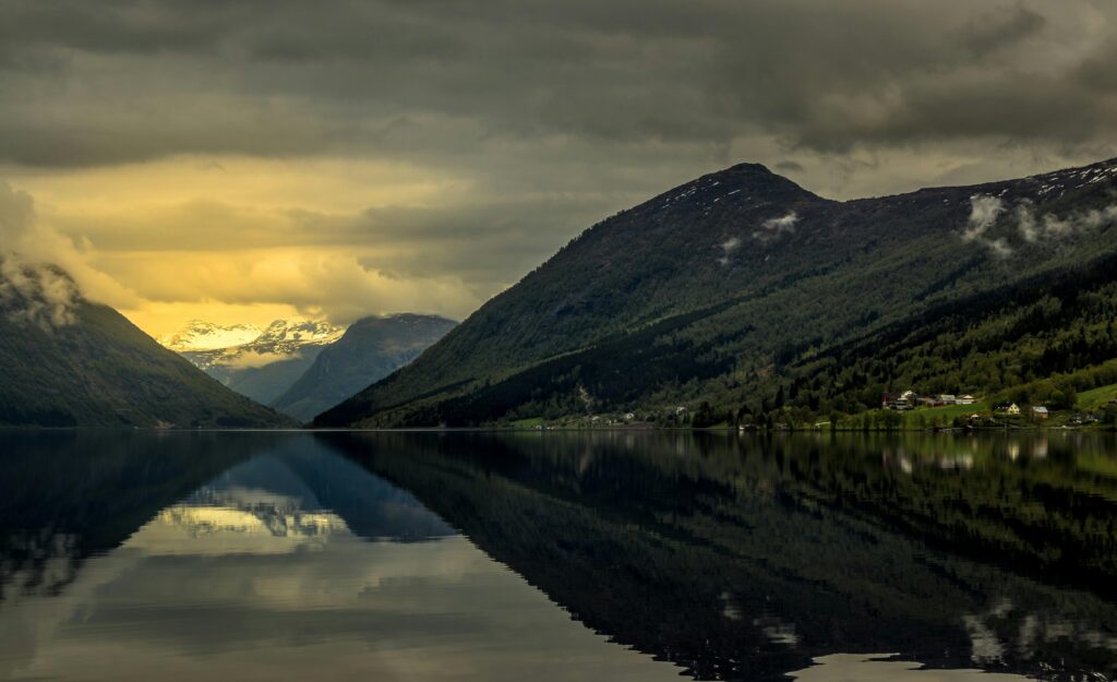 Mountain and water during sunset