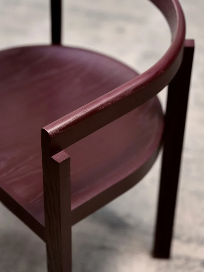 200526-Fritz-hansen-michael-anastassiades-burgundy-chair Cyprian Twist on a Classical Danish Armchair